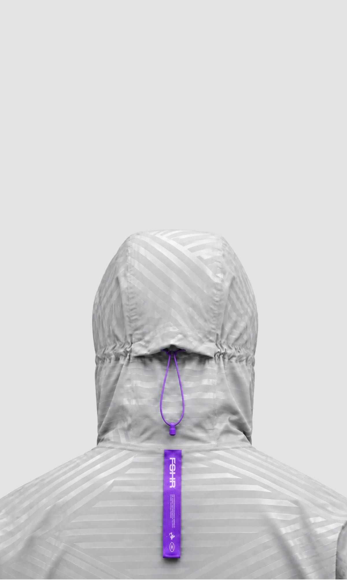 Back of a technical hooded jacket with purple FSHR detail